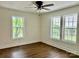 Empty bedroom with multiple windows with view to outside at 7608 Kershaw Camden Hwy, Kershaw, SC 29067