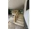 New wooden steps leading to a covered front porch at 7608 Kershaw Camden Hwy, Kershaw, SC 29067