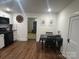 Updated kitchen and dining area featuring new appliances, dark butcher block countertops and stylish decor at 7608 Kershaw Camden Hwy, Kershaw, SC 29067