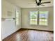 Bright living room featuring hardwood floors and plenty of natural light from double windows at 7608 Kershaw Camden Hwy, Kershaw, SC 29067