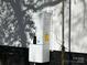 Exterior shot of wall mounted hot water heater at 7608 Kershaw Camden Hwy, Kershaw, SC 29067