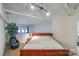 Spacious bedroom with a king-size bed and high ceilings at 929 Westmere Ave, Charlotte, NC 28208