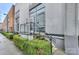 Modern building exterior with metal siding and landscaped plants at 929 Westmere Ave, Charlotte, NC 28208