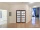 Hallway with frosted glass doors and modern flooring at 929 Westmere Ave, Charlotte, NC 28208