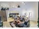 Spacious loft living room with high ceilings, modern furniture, and large windows at 929 Westmere Ave, Charlotte, NC 28208