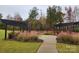 Community park featuring a walking path, black pergolas, and landscaping at 1176 Whitehall Hill Rd, York, SC 29745