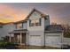 Charming two-story home features a two car garage, blue shutters and vinyl siding at 1176 Whitehall Hill Rd, York, SC 29745