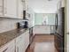 Modern kitchen features white cabinets, granite countertops, and stainless steel appliances at 1176 Whitehall Hill Rd, York, SC 29745
