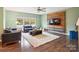 Spacious living room with a large window and a unique accent wall at 1176 Whitehall Hill Rd, York, SC 29745