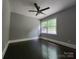 Bedroom with hardwood floors, ceiling fan, and natural light at 3337 Eastway Dr, Charlotte, NC 28205