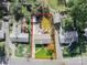 Aerial view of a property showcasing its boundaries, yard size, and overall lot layout within the neighborhood at 1166 Montford Dr, Charlotte, NC 28209