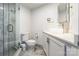 This bathroom features a glass shower, a modern vanity with a round sink, and a toilet at 1166 Montford Dr, Charlotte, NC 28209