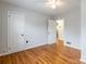 Bedroom with hardwood floors, a ceiling fan, and natural light coming through the windows at 1166 Montford Dr, Charlotte, NC 28209