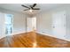 Bedroom with hardwood floors, neutral paint, ensuite access, and ample closet space at 1166 Montford Dr, Charlotte, NC 28209