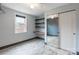 Bedroom with a large closet, built-in shelves, and natural light from the window at 1166 Montford Dr, Charlotte, NC 28209