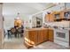 Bright kitchen featuring wood cabinets and an island at 119 Loray Ln, Statesville, NC 28625