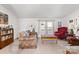 Relaxing living room with a sofa, armchair, and coffee table at 119 Loray Ln, Statesville, NC 28625