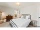 Bedroom with metal bed frame and dresser at 1547 Rye Rd, Mount Holly, NC 28120