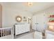 Bedroom with white dresser and decor at 1547 Rye Rd, Mount Holly, NC 28120