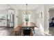 Dining area with a farmhouse style table and bench at 1547 Rye Rd, Mount Holly, NC 28120