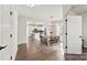 Open concept dining room with farmhouse table and kitchen views at 1547 Rye Rd, Mount Holly, NC 28120