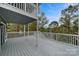 Spacious outdoor deck with white railings and scenic views of the surrounding trees at 26034 Misty Way Dr, Fort Mill, SC 29708