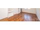 Spacious bedroom with hardwood floors and built-in shelves at 815 6Th Sw Ave, Hickory, NC 28602