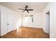 Well-lit bedroom, hardwood floors, and a ceiling fan at 815 6Th Sw Ave, Hickory, NC 28602