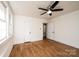 Spacious bedroom with hardwood floors and ceiling fan at 815 6Th Sw Ave, Hickory, NC 28602