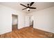 Bright bedroom with hardwood floors and ceiling fan at 815 6Th Sw Ave, Hickory, NC 28602