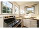 Kitchen with stainless steel appliances and white cabinets at 815 6Th Sw Ave, Hickory, NC 28602