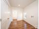 Laundry room with window and hardwood floors at 815 6Th Sw Ave, Hickory, NC 28602