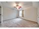 Neutral bedroom with ceiling fan and carpeted floors at 5225 Rocky River Crossing Rd, Harrisburg, NC 28075