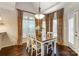 Breakfast nook with hardwood floors and window seating at 7484 Brentfield Ln, Stanley, NC 28164