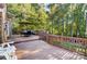 Spacious deck with seating and wooded views at 7484 Brentfield Ln, Stanley, NC 28164