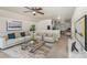 Bright living room featuring a neutral color palette, modern furnishings, and an open floor plan at 135 Anastasia Ln, Lincolnton, NC 28092