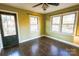 Bright dining area with tile floor, access to backyard, and large windows at 326 Clark St, Statesville, NC 28677