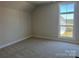 Bedroom with carpet, a window, and base molding at 4374 Morning Mist Dr # 25, Sherrills Ford, NC 28673