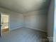 Bedroom with carpet, recessed lighting, view to upstairs hallway and a window at 4374 Morning Mist Dr # 25, Sherrills Ford, NC 28673
