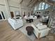 Open-concept living area with ample seating, modern decor, and light wood floors, perfect for entertaining guests at 4374 Morning Mist Dr # 25, Sherrills Ford, NC 28673