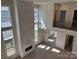 Living room with a lot of windows and a view of the upstairs hallway at 4374 Morning Mist Dr # 25, Sherrills Ford, NC 28673