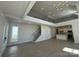 Open-concept living room with staircase and modern kitchen in the background at 4374 Morning Mist Dr # 25, Sherrills Ford, NC 28673