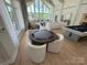Spacious recreation area includes lounge seating, a pool table, and a game table, designed for entertainment at 4374 Morning Mist Dr # 25, Sherrills Ford, NC 28673