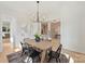 Charming dining room with a hardwood floors, stylish chandelier, and decorative wall art at 571 Lyttleton Dr, Charlotte, NC 28211