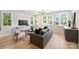 Modern living room featuring hardwood floors, and comfortable seating at 571 Lyttleton Dr, Charlotte, NC 28211