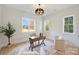 A bright office space with natural light and a neutral color palette at 571 Lyttleton Dr, Charlotte, NC 28211