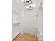Spacious walk-in closet with custom shelving and modern lighting fixture at 571 Lyttleton Dr, Charlotte, NC 28211