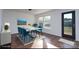 Bright dining room showcasing stylish furnishings, a modern chandelier, and luxury vinyl plank flooring at 310 Foster Ln, Albemarle, NC 28001