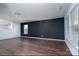 A spacious and versatile living area with a neutral color scheme and plenty of natural light at 310 Foster Ln, Albemarle, NC 28001