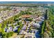 A stunning aerial view showcases the neighborhood with fall foliage and manicured lawns in a vibrant community at 4006 Trinity Ct, Indian Land, SC 29707